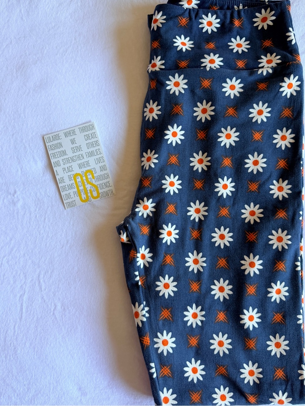 LuLaRoe Navy Daisy Print Leggings with Orange Accents